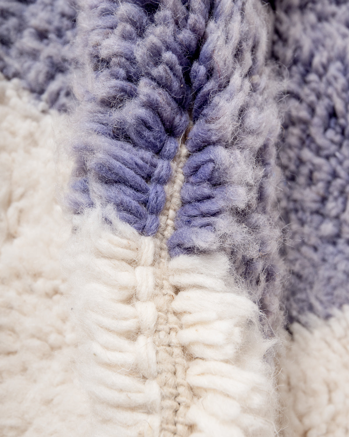 Modern, designer, handcrafted Berber rug from Morocco. Beniourain carpet with beautiful colours and patterns and fluffy wool texture.